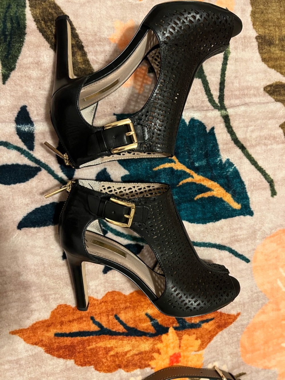 Like New Black Cutout Peep-Toe Leather Pumps with Gold Buckle